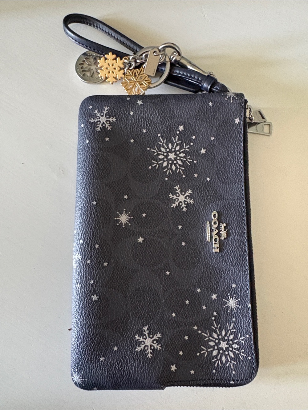 Coach Blue Wristlet with Silver Snowflake Accents